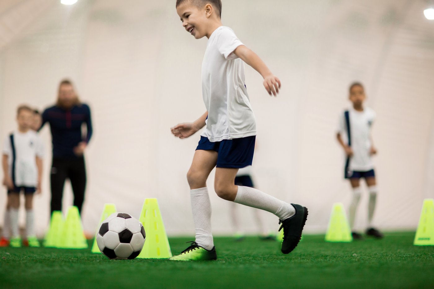 Youth sports training on the indoor turf at CrossFit Saol
